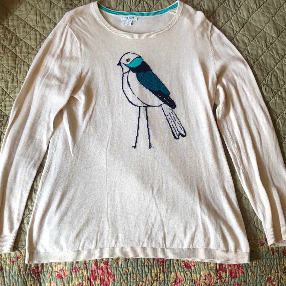White sweater with cute blue bird design